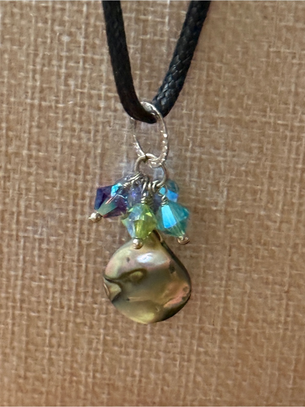 Women’s necklace with abalone shell pendant and crystal beads